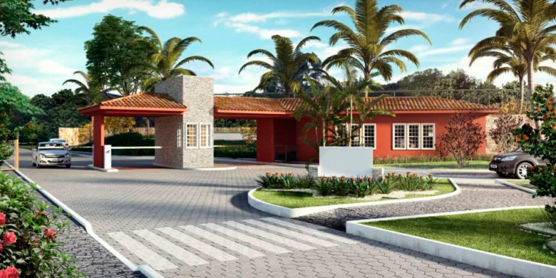Entrada de um loteamento residencial arborizado